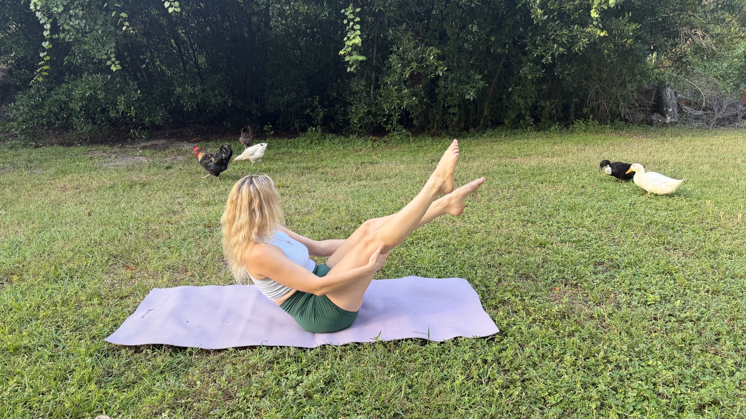 Pilates teaser variation outdoors